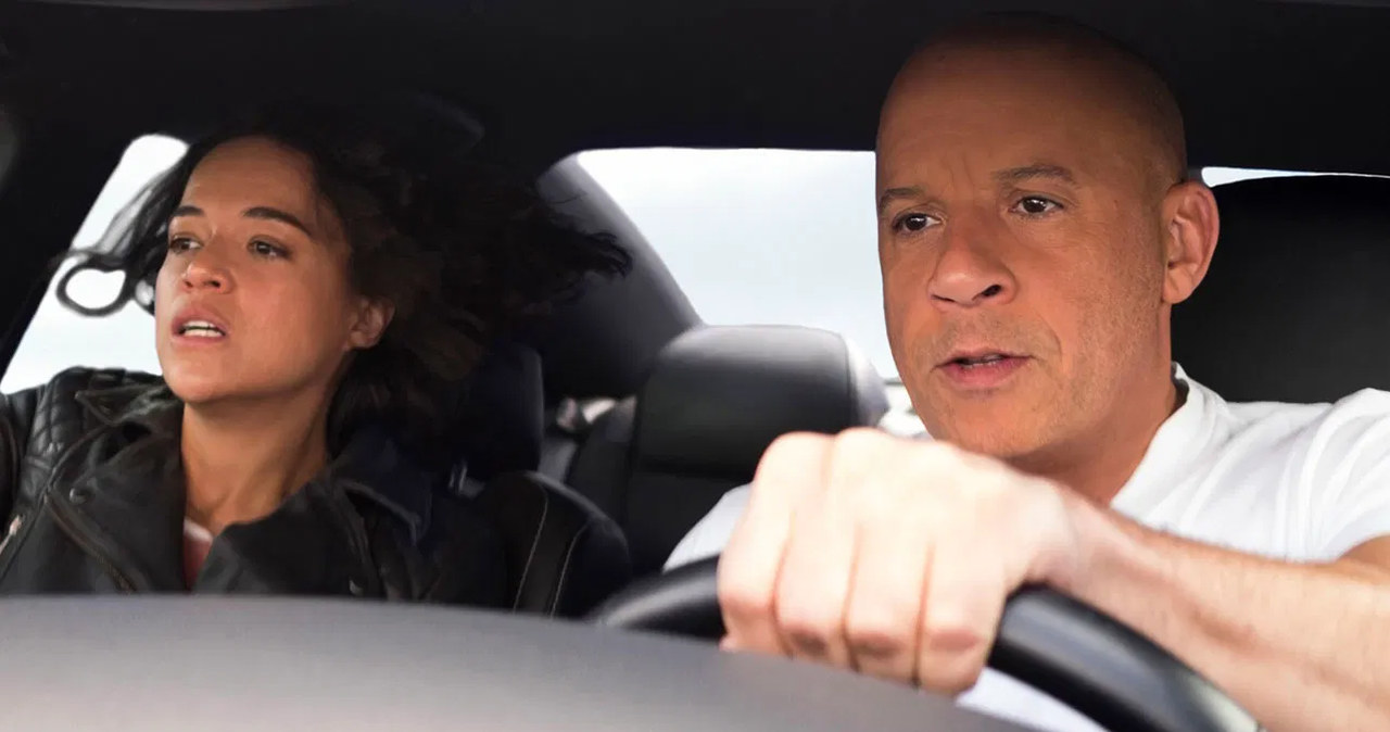 Michelle Rodriguez i Vin Diesel w scenie z filmu "Szybcy i wściekli 9" /materiały prasowe