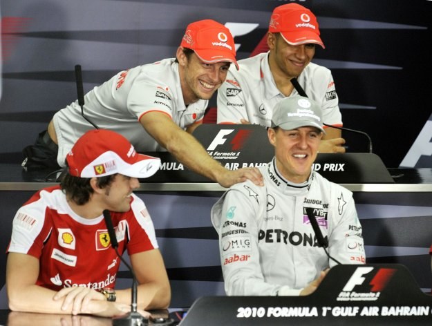 Mistrzowie w komplecie: Button i Hamilton (górny rząd) oraz Alonso i Schumacher /AFP