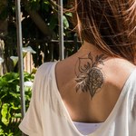 Modne wzory na tatuaż na plecach. Intrygujące i piękne
