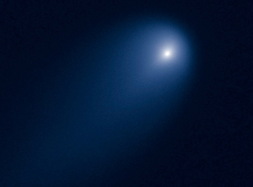 Możliwe, że kometa ISON zaczęła się rozpadać po zbliżeniu do Słońca /AFP