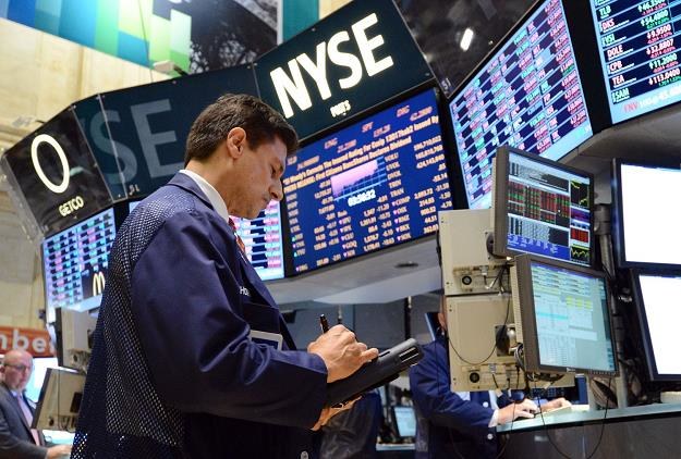 Na Wall Street małe zmiany w oczekiwaniu na wyniki spółek /AFP