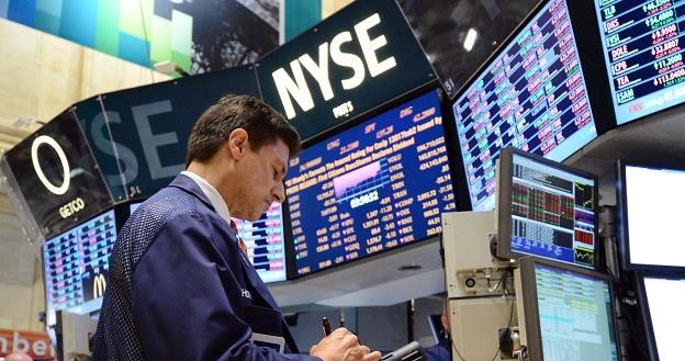 Na Wall Street małe zmiany w oczekiwaniu na wyniki spółek /AFP