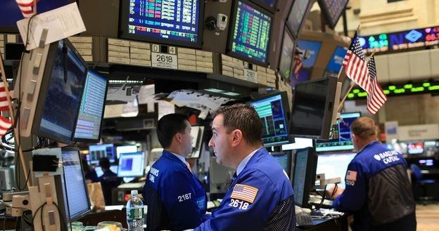 Na zamknięciu Dow Jones Industrial wzrósł o 1,59 proc. do 12 258,20 pkt. /AFP