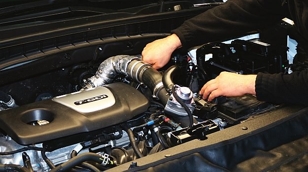 Na zdjęciu montaż instalacji bezpośredniego wtrysku LPG w modelu Hyundai Tuscon III 1.6 T-GDI. /Motor