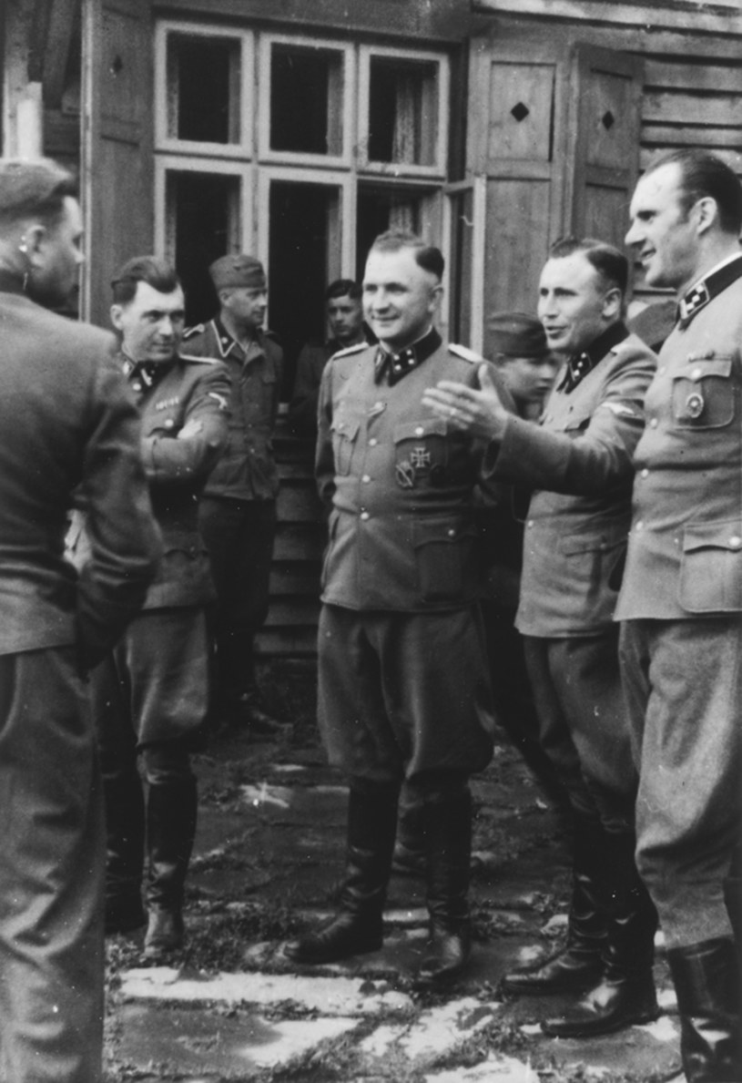 Niemieccy oprawcy (od lewej): komendant z obozu Bergen-Belsen Josef Kramer oraz działający w KL Auschwitz: dr Josef Mengele, zwany "aniołem śmierci", komendant Richard Baer i jego asystent Karl Hoecker /Holocaust Memorial Museum / AFP /AFP