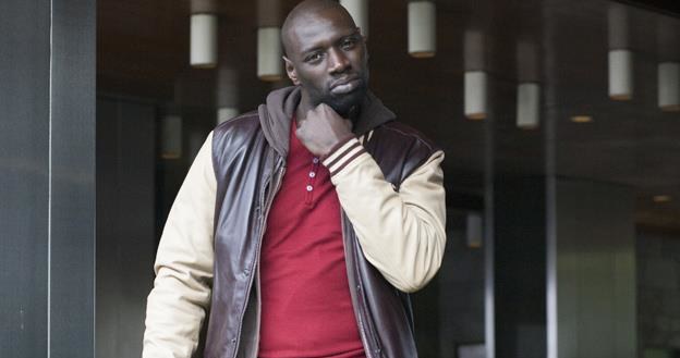 Omar Sy w scenie z filmu Nieobliczalni" /materiały dystrybutora