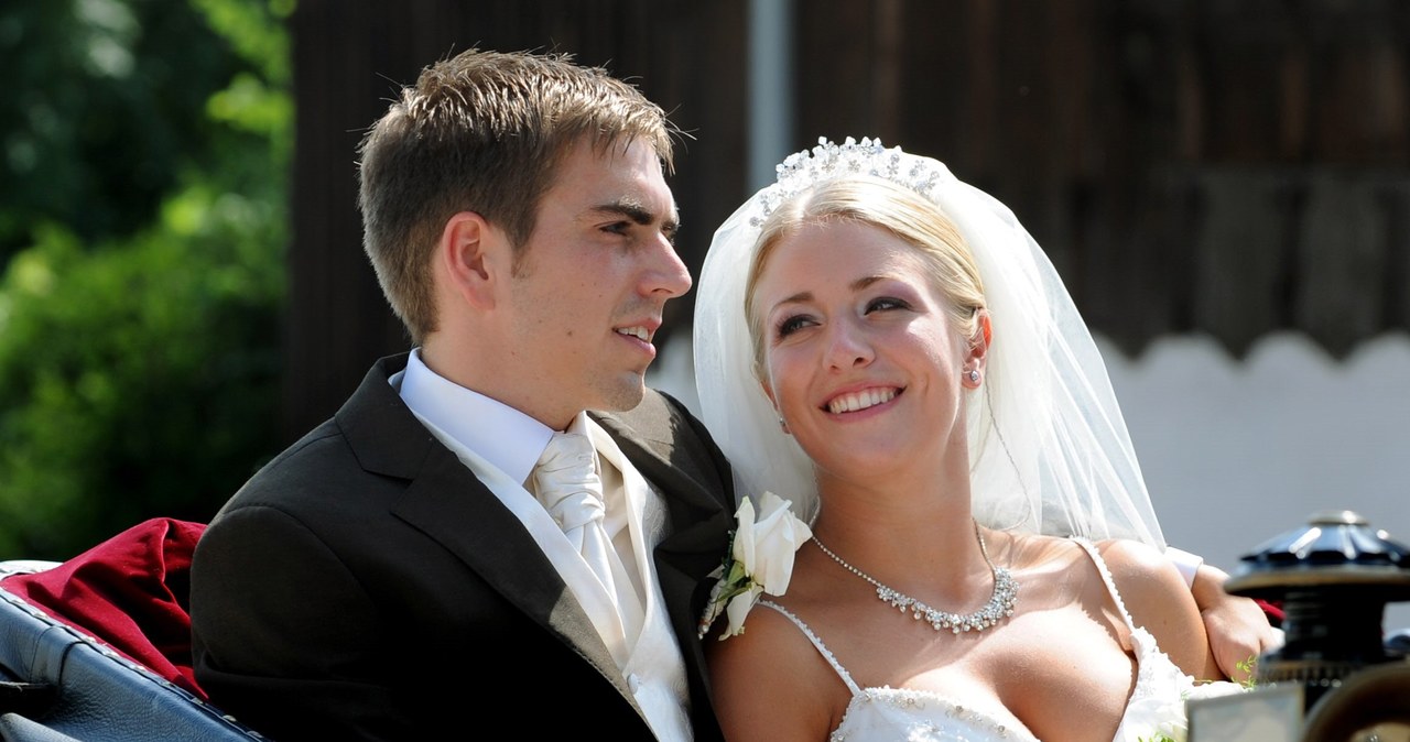 Philipp Lahm z żoną Claudią /AFP