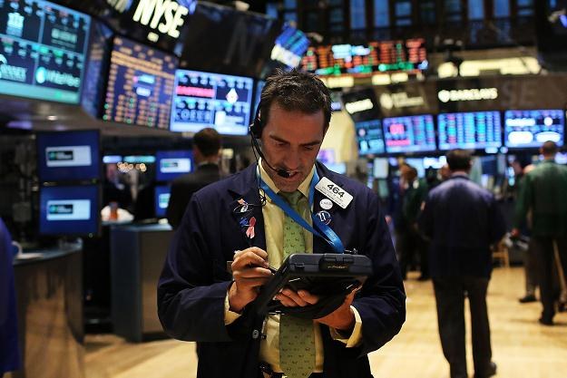 Piątkowa sesja na Wall Street w pierwszej części dnia przebiegała spokojnie /AFP