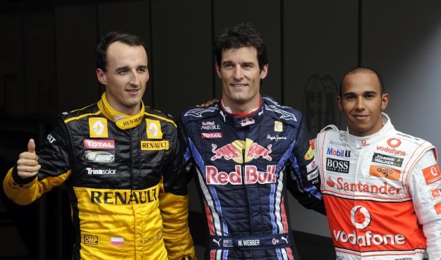 Pierwsza trójka kwalifikacji do GP Belgii: Robert Kubica, Mark Webber i Lewis Hamilton /AFP