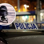 Pijany ojciec z dzieckiem spacerował środkiem drogi. Wskoczył na maskę auta