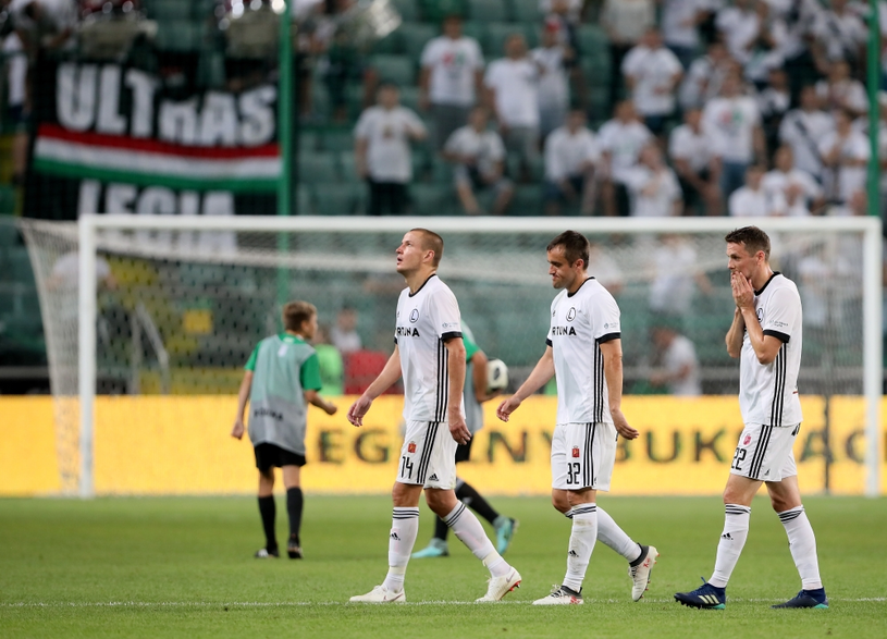  Legia players Adam Hlousek, Miroslav Radovic and Kasper Hamalainen after losing to Spartak Trnawa / Leszek Szymanski / PAP 