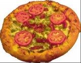 Pizza przyszłości ma mieć równą warstwę sosu pokrywającą plasterki pieczarek, szynki, pomidorów /RMF