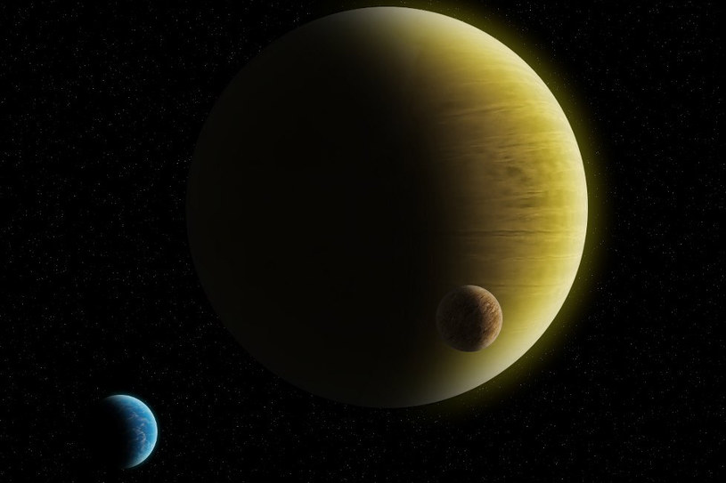Potencjalny wygląd HD 145934 b - gazowy gigant z dwoma dużymi księżycami, z których jeden jest w całości pokryty oceanem. Źródło: K. Kanawka. /Kosmonauta