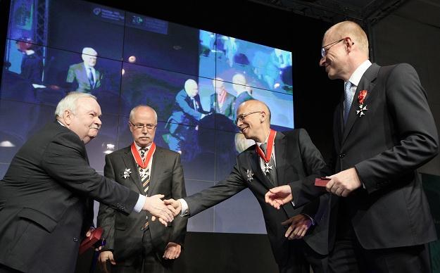 Prezes GPW Ludwik Sobolewski (P), Witold Rozłucki (2P), Jacek Socha (2L) i Grzegorz Domański (L) /PAP