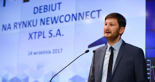 Prezes XTPL Filip Granek podczas debiutu spółki na NewConnect /PAP