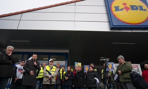 Przewodniczący Solidarności Piotr Duda (2L) i Dominik Kolorz  (L) /PAP