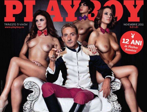 Radu Mazare na okładce "Playboya". Oczywiście w towarzystwie "króliczków"... /East News