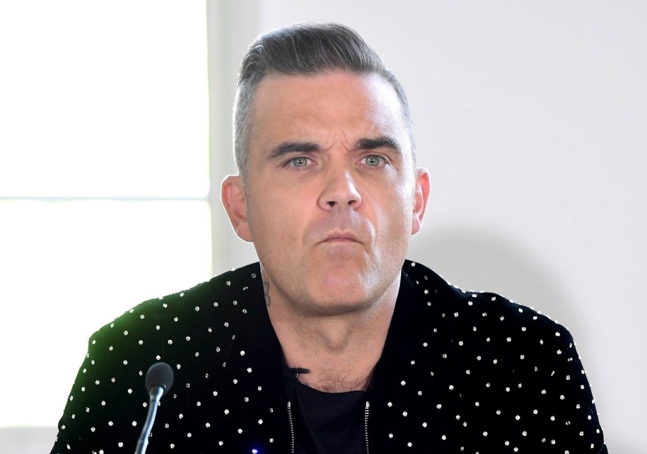 Robbie Williams nazwał Jimmy'ego Page'a wariatem /Ian West /PAP/PA