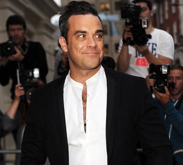 Robbie Williams wrócił do łask kapryśnej brytyjskiej publiczności - fot. Ben Pruchnie /Getty Images/Flash Press Media