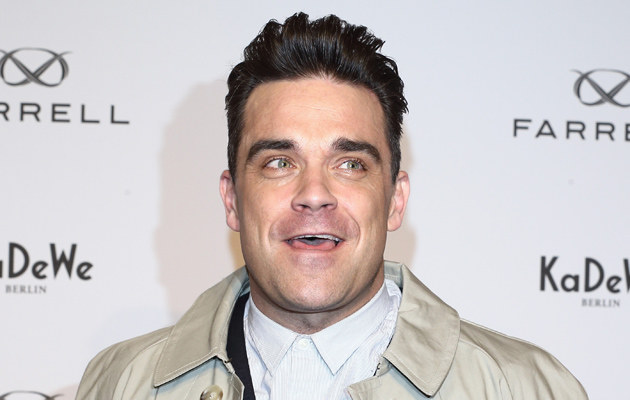Robbie Williams złamał rękę fance! /Andreas Rentz /Getty Images
