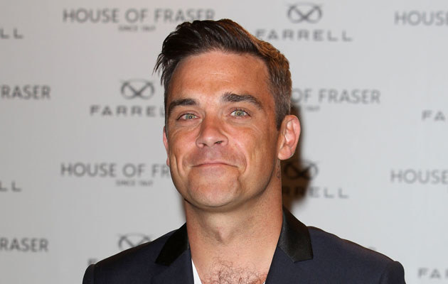 Robbie Williams /Tim Whitby /Getty Images