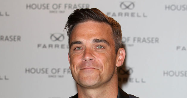 Robbie Williams /Tim Whitby /Getty Images