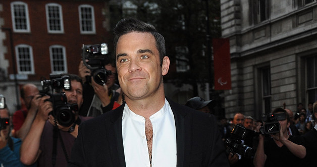 Robbie Williams /Ben Pruchnie /Getty Images