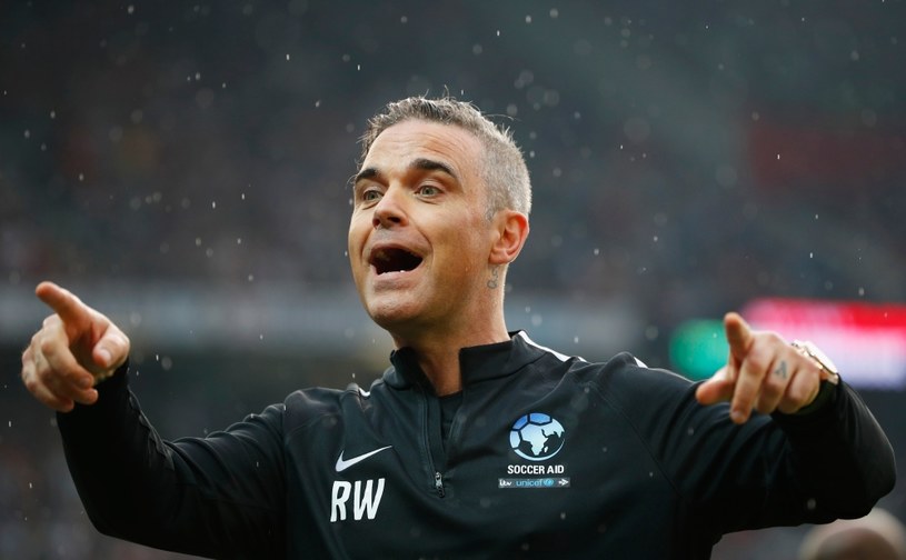 Robbie Williams /Lynne Cameron /Getty Images