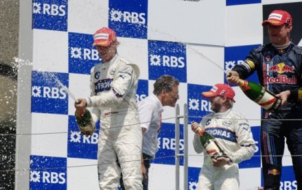 Robert Kubica i David Coulthard na podium w Kanadzie /AFP
