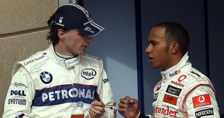 Robert Kubica i Lewis Hamilton /AFP