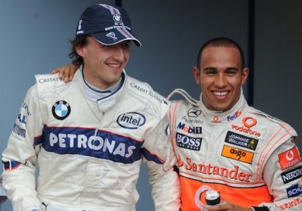 Robert Kubica i Lewis Hamilton /AFP
