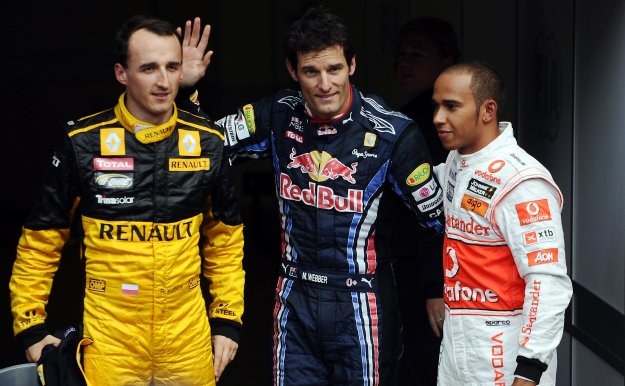 Robert Kubica, Mark Webber i Lewis Hamilton, czyli najszybsi w kwalifikacjach /AFP