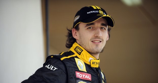 Robert Kubica prezentuje się w stroju teamu Renault /AFP