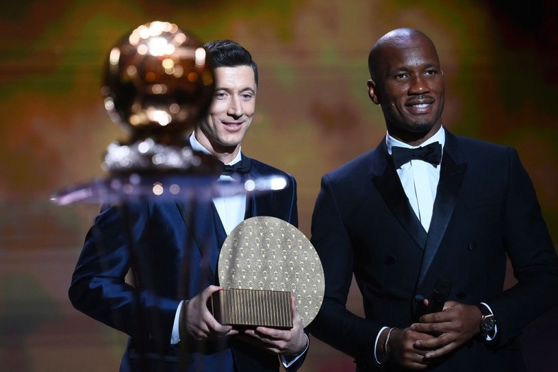 Robert Lewandowski i Didier Drogba /AFP