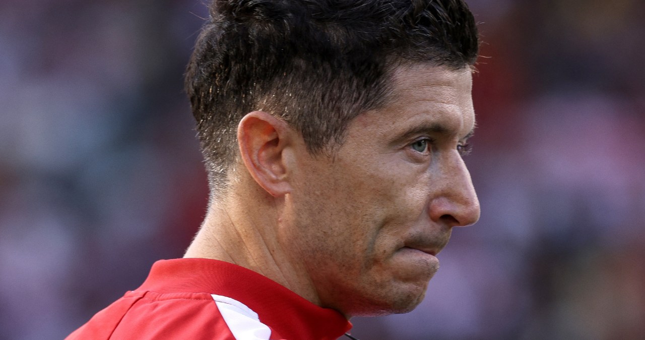 Robert Lewandowski zrobił sobie zdjęcie z kibicem Realu Madryt /AFP