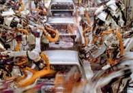 Roboty w fabryce Toyoty /Encyklopedia Internautica