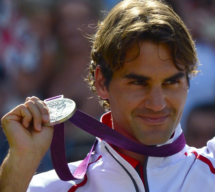 Roger Federer z olimpijskim medalem /AFP