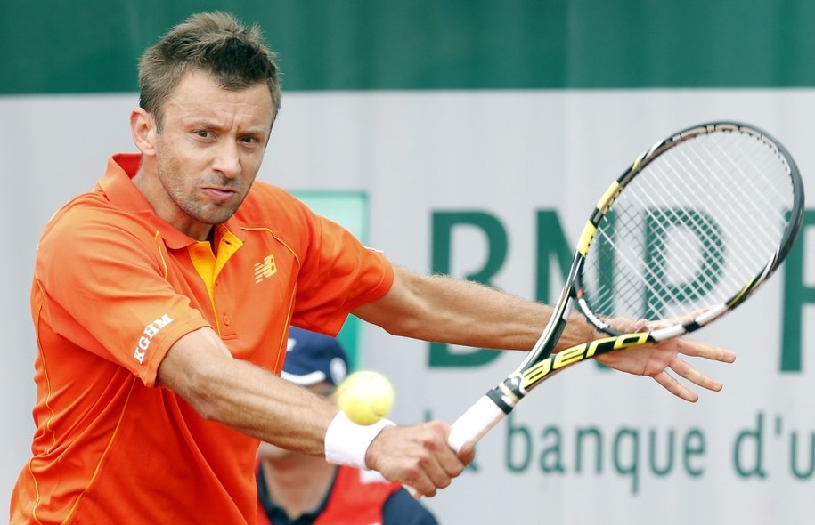 Roland Garros: Michał Przysiężny w pojedynku z Finem Jarkko Nieminenem /ETIENNE LAURENT /PAP/EPA