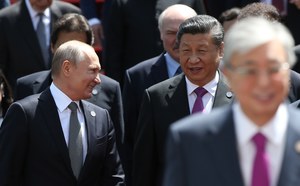 Russian bear in the shadow of a Chinese dragon.  How Putin became a younger brother