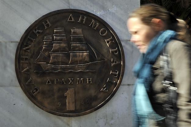 Rozwiązanie kryzysu Grecji polegać może na wprowadzeniu do obiegu drugiej, obok euro, waluty /AFP