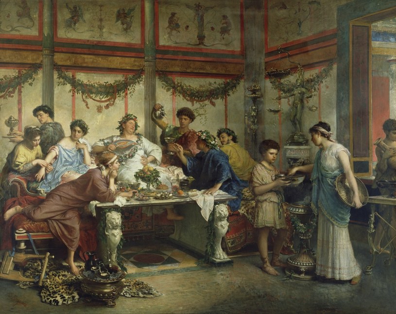 Saturnalia były najważniejszym rzymskim świętem. Obraz: Roberto Bompiani, "Rzymska uczta" 1885-1899 /Fine Art Images/Image State /East News