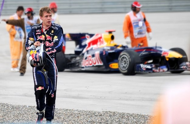 Sebastian Vettel musiał - po kolizji z Webberem - wycofać się z wyścigu /AFP