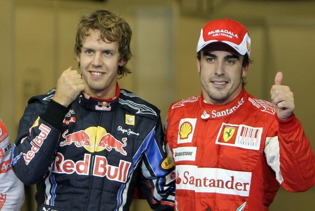 Sebastian Vettel (z lewej) i Fernando Alonso moga zostać kolegami z zespołu /AFP