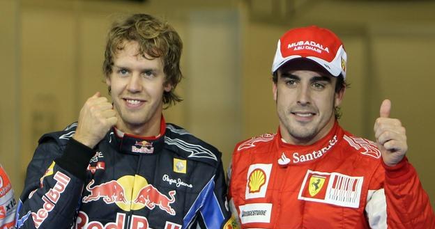 Sebastian Vettel (z lewej) i Fernando Alonso moga zostać kolegami z zespołu /AFP