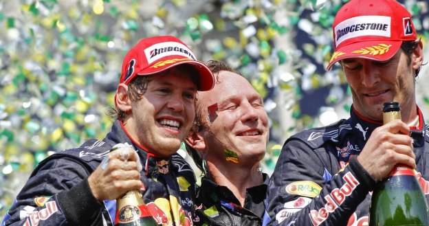 Sebastian Vettel (z lewej) i Mark Webber, kierowcy Red Bulla /AFP