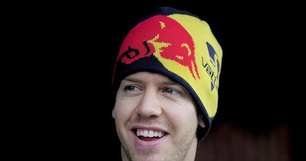 Sebastian Vettel związał się z Red Bull Racing czteroletnią umową /AFP