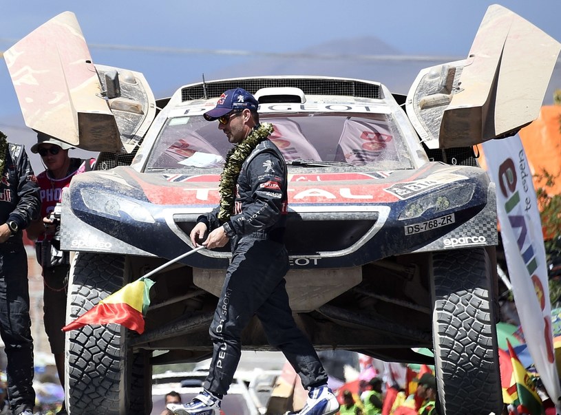 Sebastien Loeb i jego Peugeot /AFP