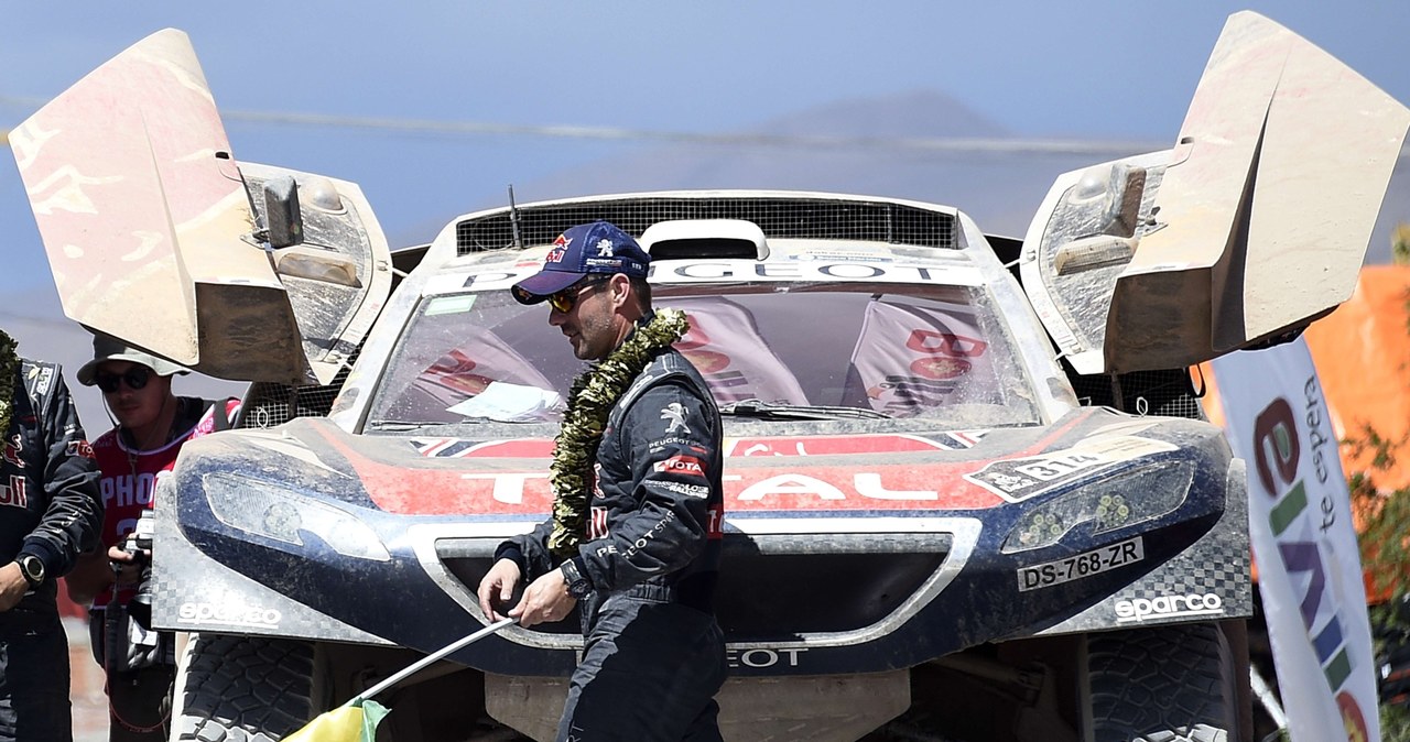 Sebastien Loeb i jego Peugeot /AFP