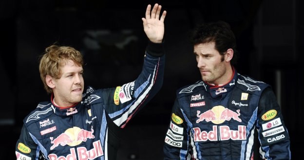 Sebatsina Vettel (z lewej) i Mark Webber. Na kierowców Red Bulla nie ma mocnych w kwalifikacjach /AFP