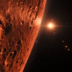 Sensacyjne odkrycie astronomów: Czerwony karzeł i jego siedem podobnych do Ziemi planet